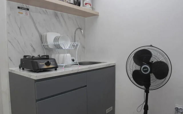 Cozy Style 2BR at Green Pramuka City Apartment