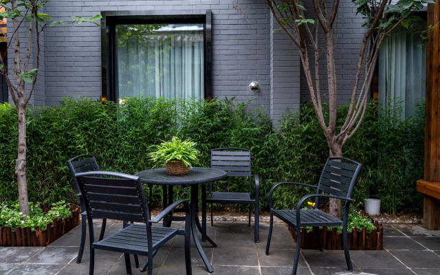 Qiuguo Hutong Courtyard Hotel