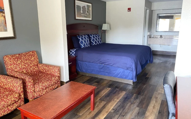 Magnolia Inn And Suites