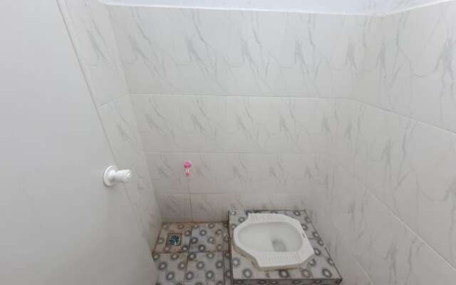 SPOT ON 93464 Penginapan Tulimario Syariah