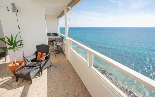 Beachfront Penthouse with Ocean and Sunset Views at Pelican Reef #703