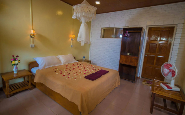 Teak Wood Hotel