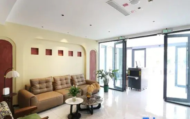 Huajian Minsha Hotel (Youhao Fashion Shopping Center)