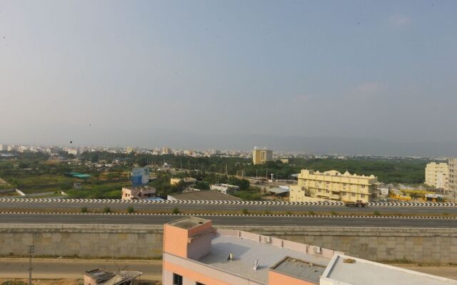 OYO 10701 Moukthi Apartment