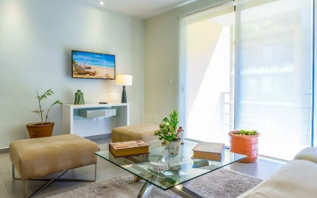 Lunada 314 Modern Playa del Carmen Condo with Tropical Garden View by RedAwning