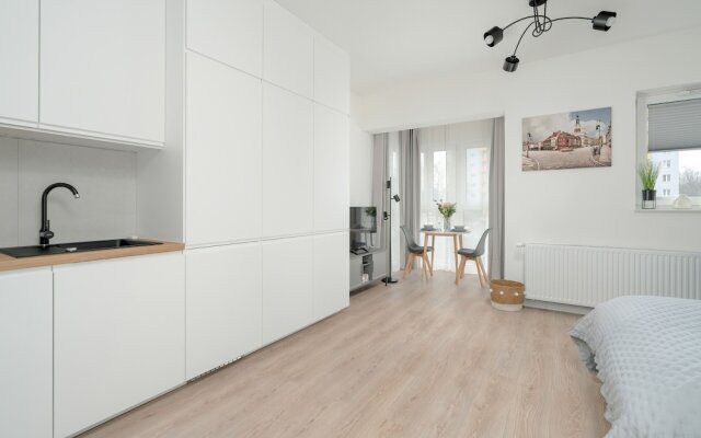 Minimalist Studios in Poznań by Renters