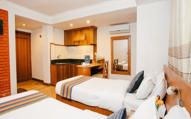 Osho Holiday Inn by OYO Rooms