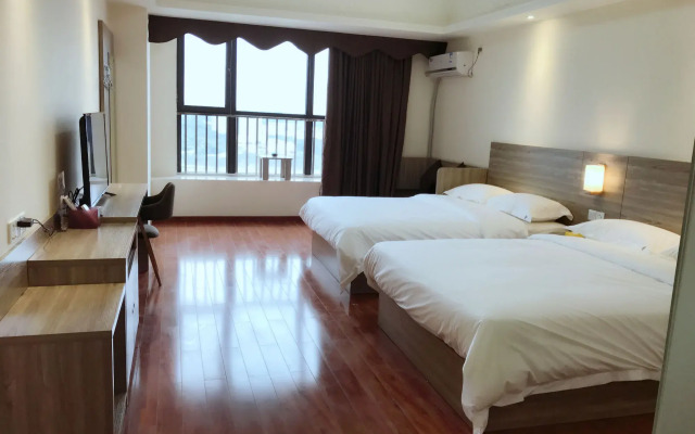 Xingyue Apartment Luogang Wanda