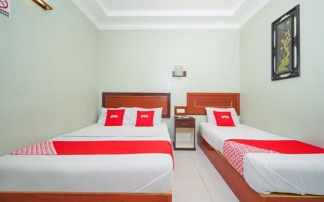 Fins Hotel by OYO Rooms