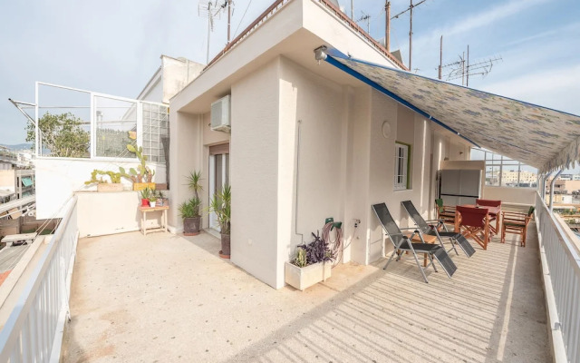 Sunny Loft in Koukaki by Cloudkeys