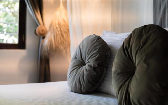 KIMA Serviced Beach House & Suites