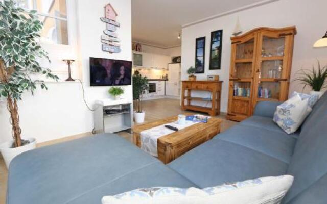 Kurparkresidenz Baabe - Ferienwohnung Meeresgarten mit Terrasse