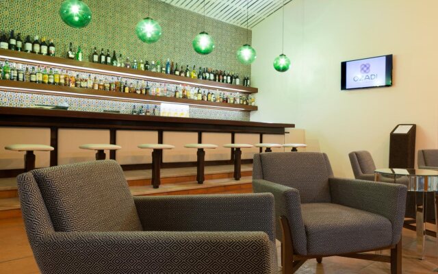 Ozadi Tavira Hotel