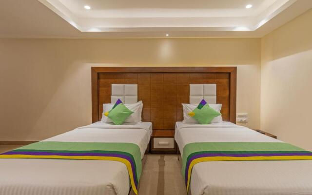 Treebo Suvarna Comforts