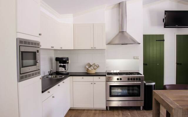 Nice house with a garden, surrounded by forest