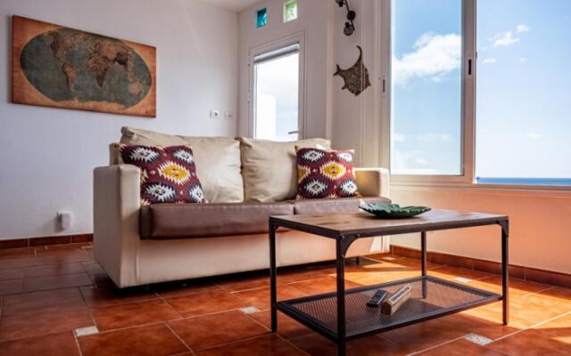 Canary casita next to the Atlantic Ocean