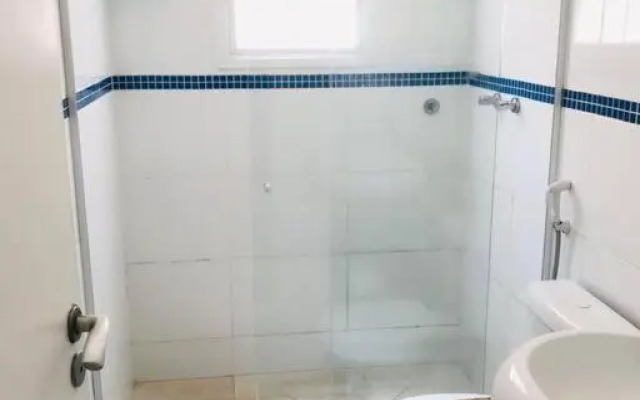 Casa de praia com piscina e churrasqueira - Indaiá Bertioga