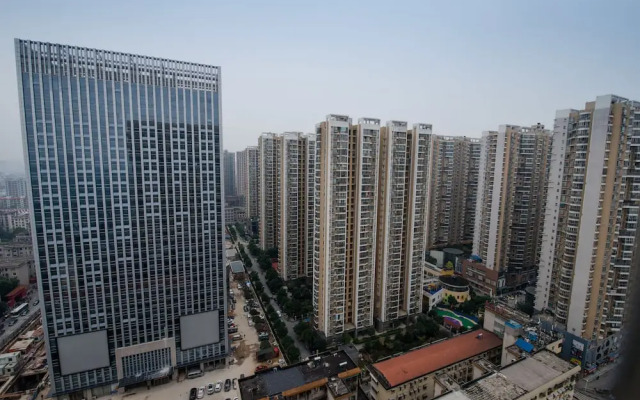 Xin Wo Hotel Apartment Railway Station