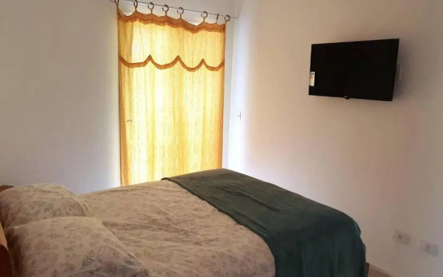 Casa com varanda, ar condicionado pet friendly