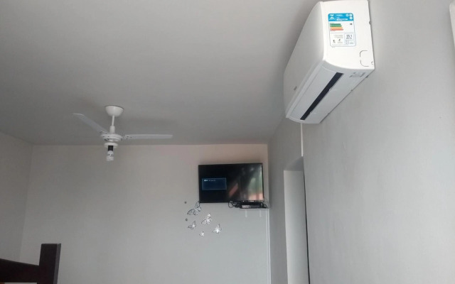 Suíte com Cozinha independente em Apartamento