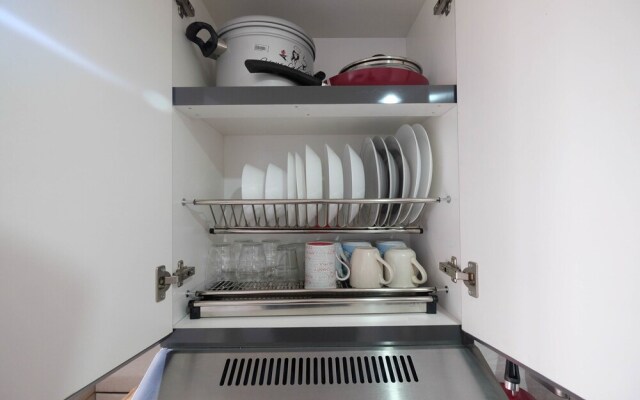 Minimalist and Posh 1BR The Oasis Cikarang Apartment