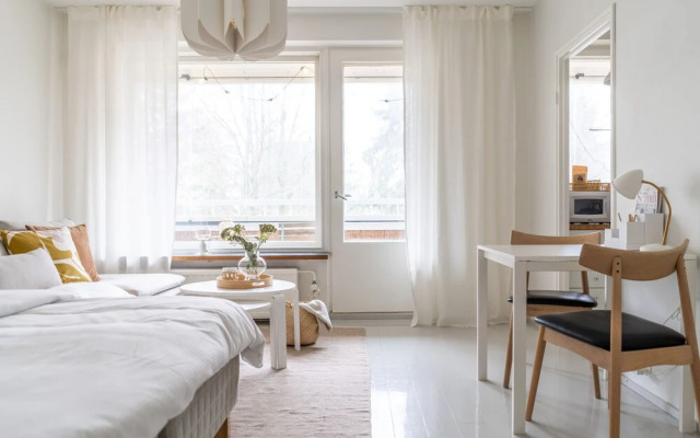Upper floor studio with a balcony