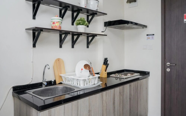 Compact and Monochrome Studio Room Bintaro Icon Apartment