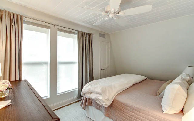 Roomy Chalet-Style Beachfront Condo with Private Beach Access by RedAwning