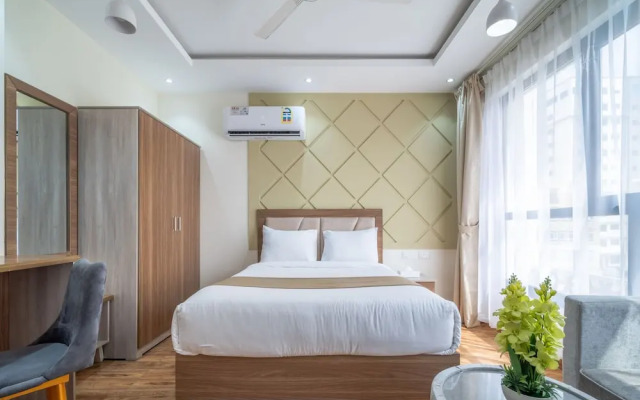 OYO Townhouse 156 Rose Hotel Apartments.