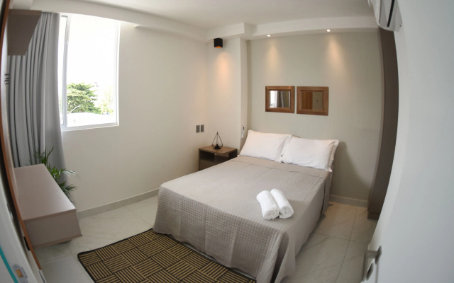 Pé na areia do Caribessa - Branco Haus