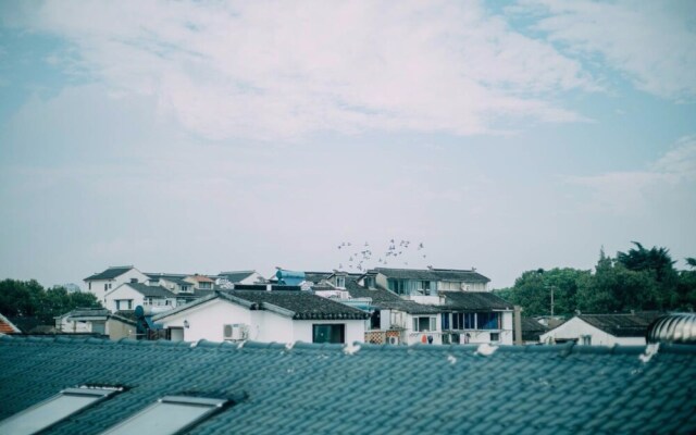 Suzhou Hezizai Inn