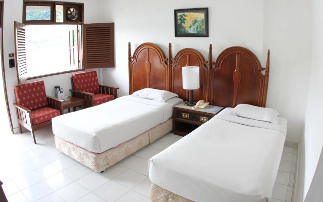 Danau Toba International Cottage