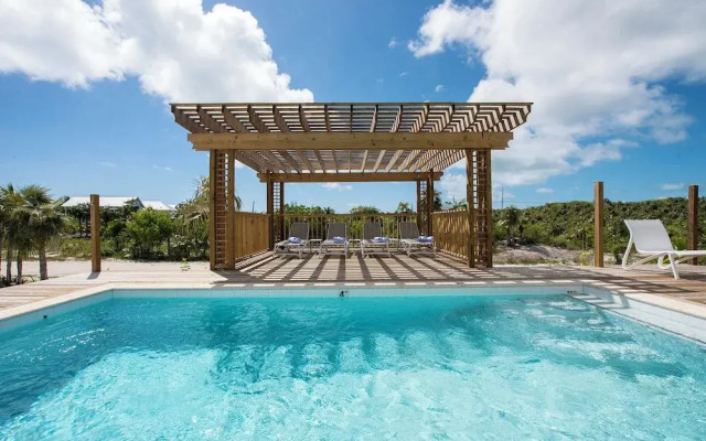 Tropical Haven: Luxurious Home Steps From Beach