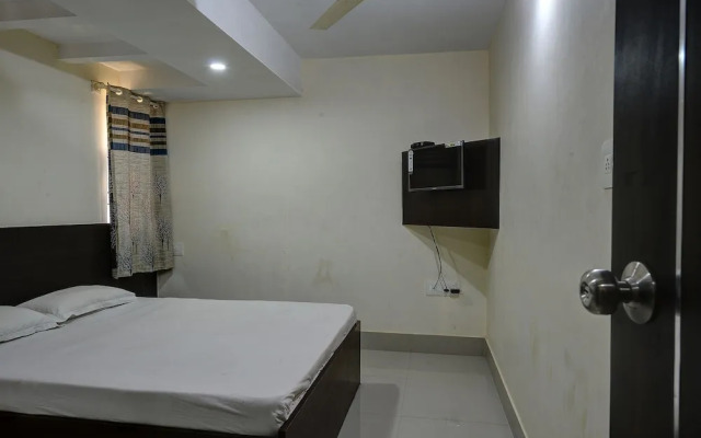 SPOT ON 37153 Karavali Paradise