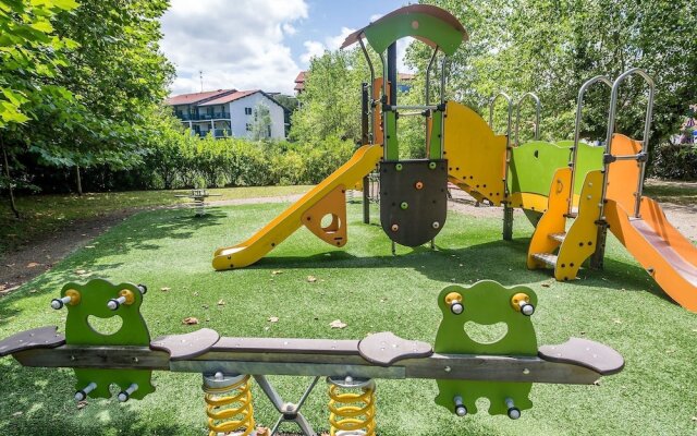 Spacious apartment with terrace surrounded by pine trees