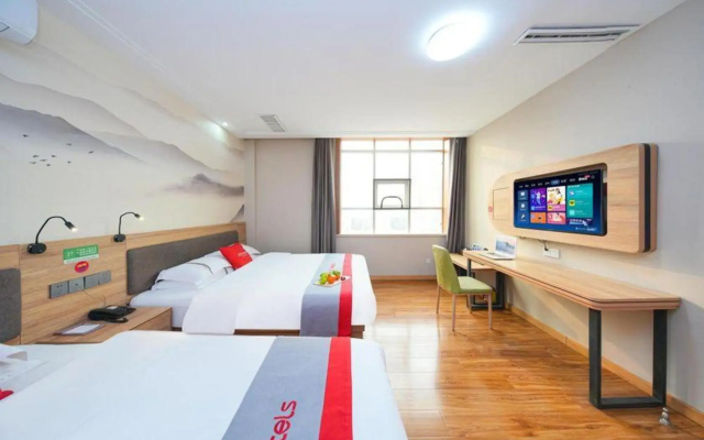 Junyi chain hotel (Qingdao Dongjiakou gangpoli bus station store)