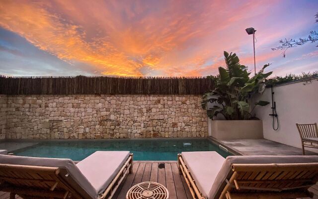 S Estancia Suites