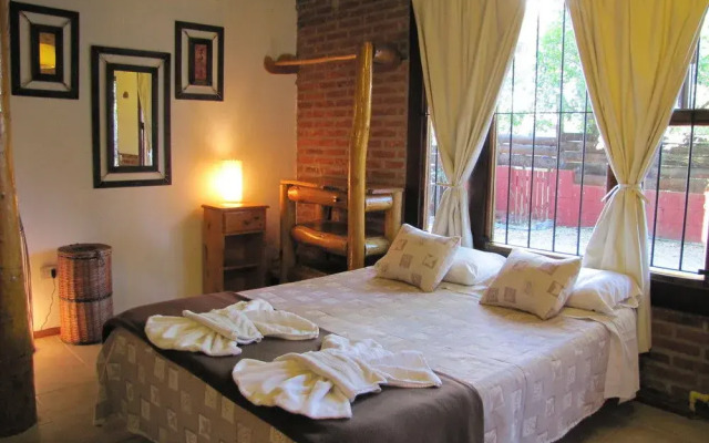 Loma Escondida Apart Cabañas & Spa