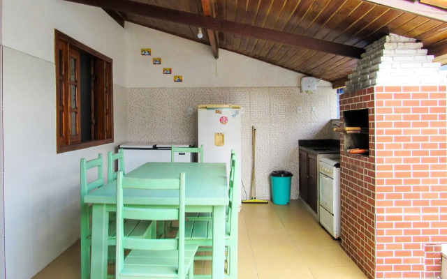 Casa com 4 Suítes, Piscina, Área Gourmet e Wifi