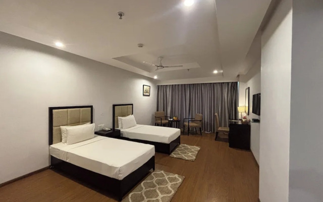 Triguna Clarks Inn