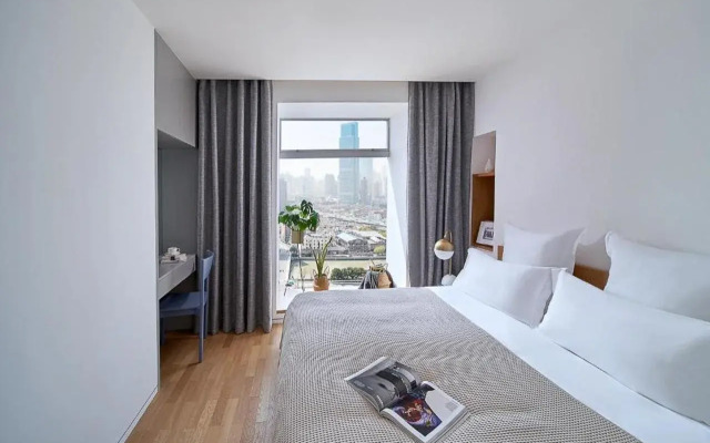 base SUHE Serviced Apartment