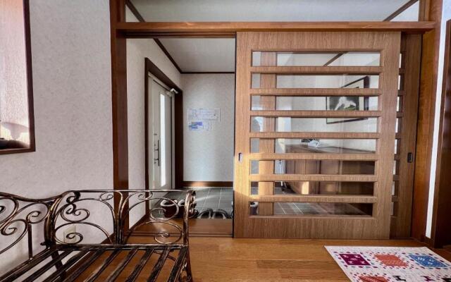 Yellow House by Lake Toya