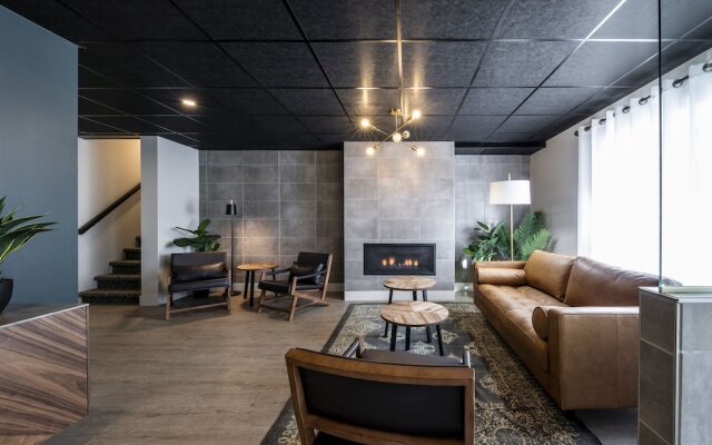 Square Victoria Maison Hôtelière