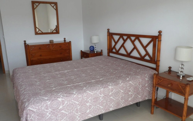 Apartamento Praia de Porches,izibookings
