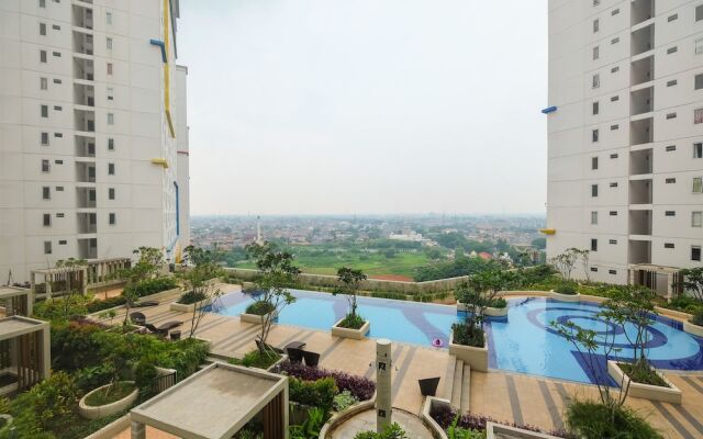 Spacious 2 Bedroom at Bassura City Apartment By Travelio