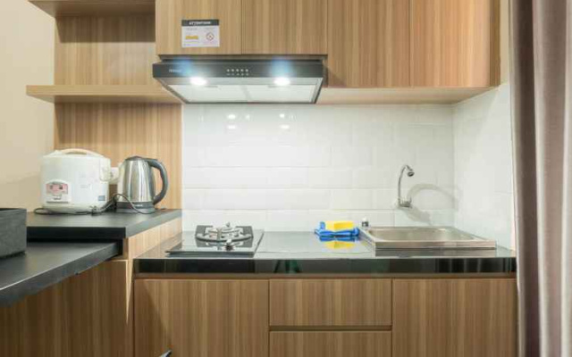 Splendid 2BR Apartment at Bassura City By Travelio
