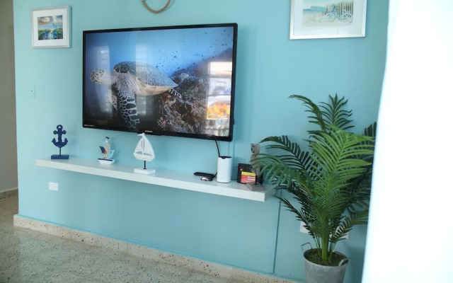 Tropical Breeze Escapes Couples Studio