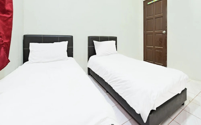 Oyo 90596 Casaria Inn