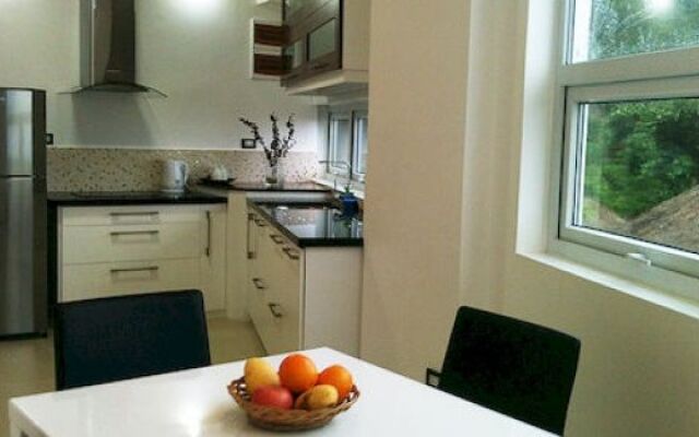 Karuna Suites & Residence