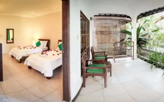Tir Na Nog Beachfront Resort